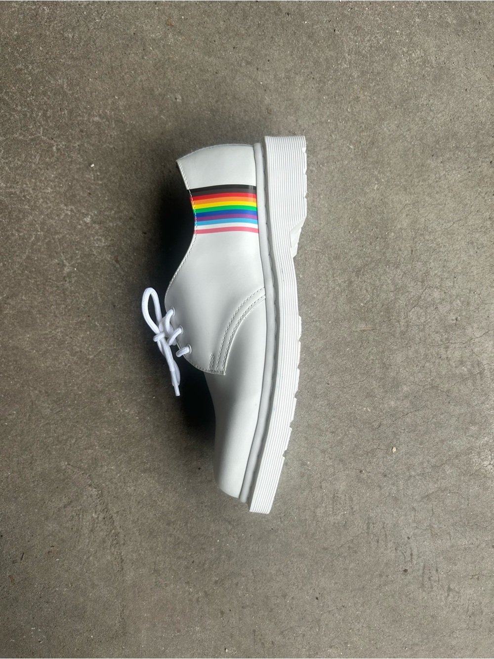 Dr. Martens White Lace-Up Flat with Rainbow Heel Stripe